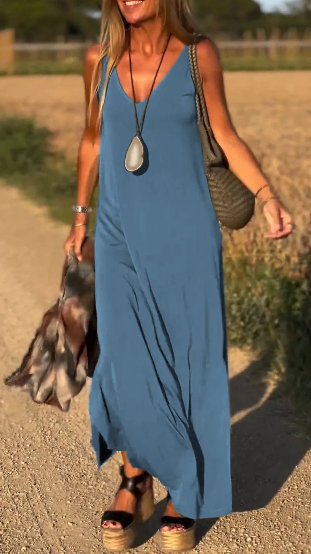 Evelyne - Elegante Lange Mouwloze Jurk