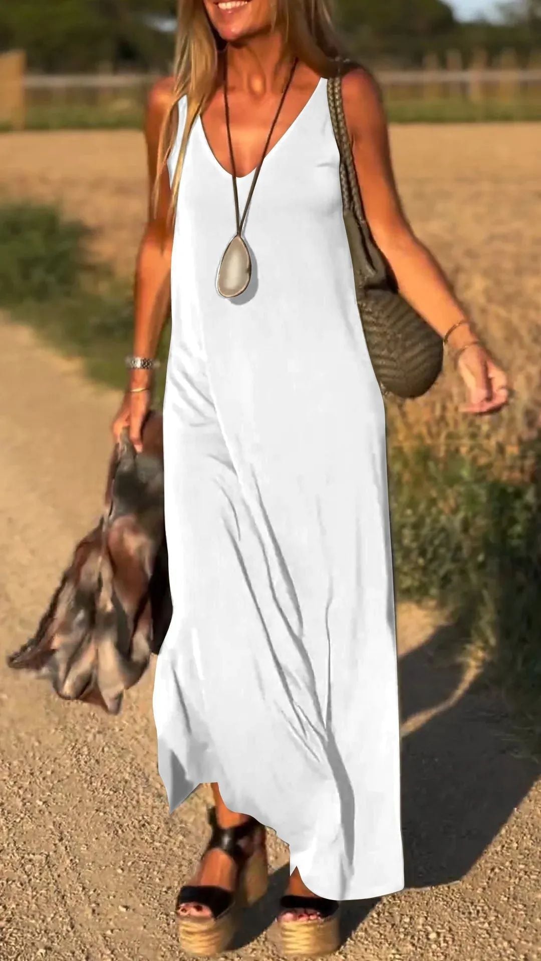 Evelyne - Elegante Lange Mouwloze Jurk