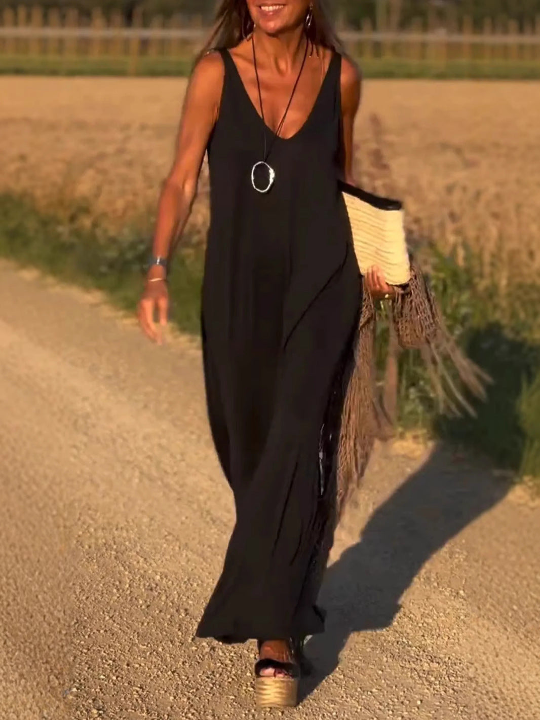 Evelyne - Elegante Lange Mouwloze Jurk